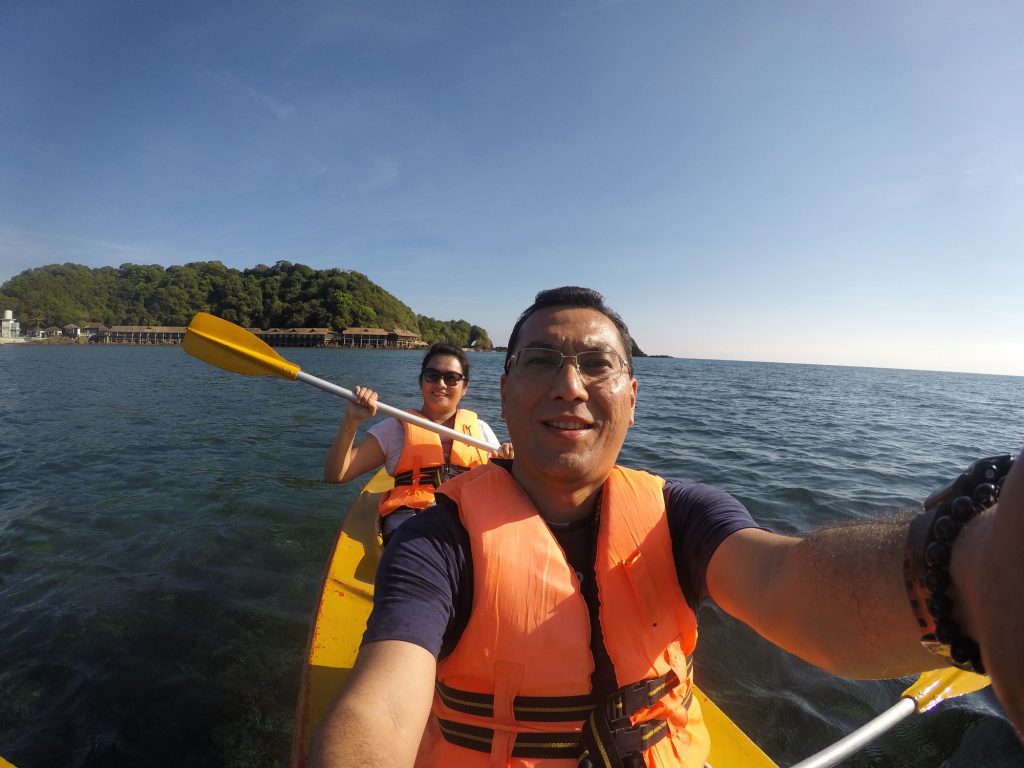 Happy couples enjoy kayaking.